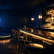 Strip Bar Near Me: an empty club room lit for the evening